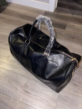 Louis Vuitton Black Monogram Embossed Duffel Bag